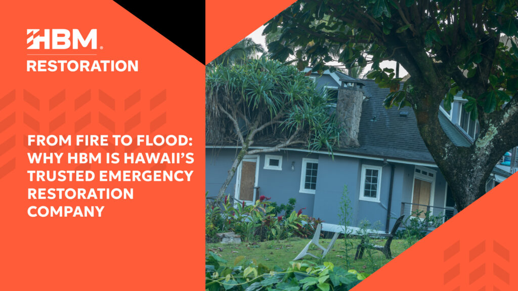 A blue-gray Hawaiian house tilts precariously after damage due to a disaster.